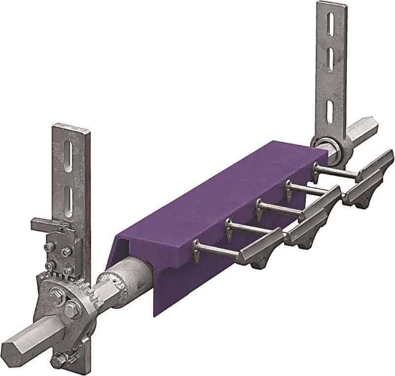Sekundärabstreifer, ein violetter Abstreifer, der auf einer Achse angebracht ist, die wiederum an Haltestangen fixiert ist.