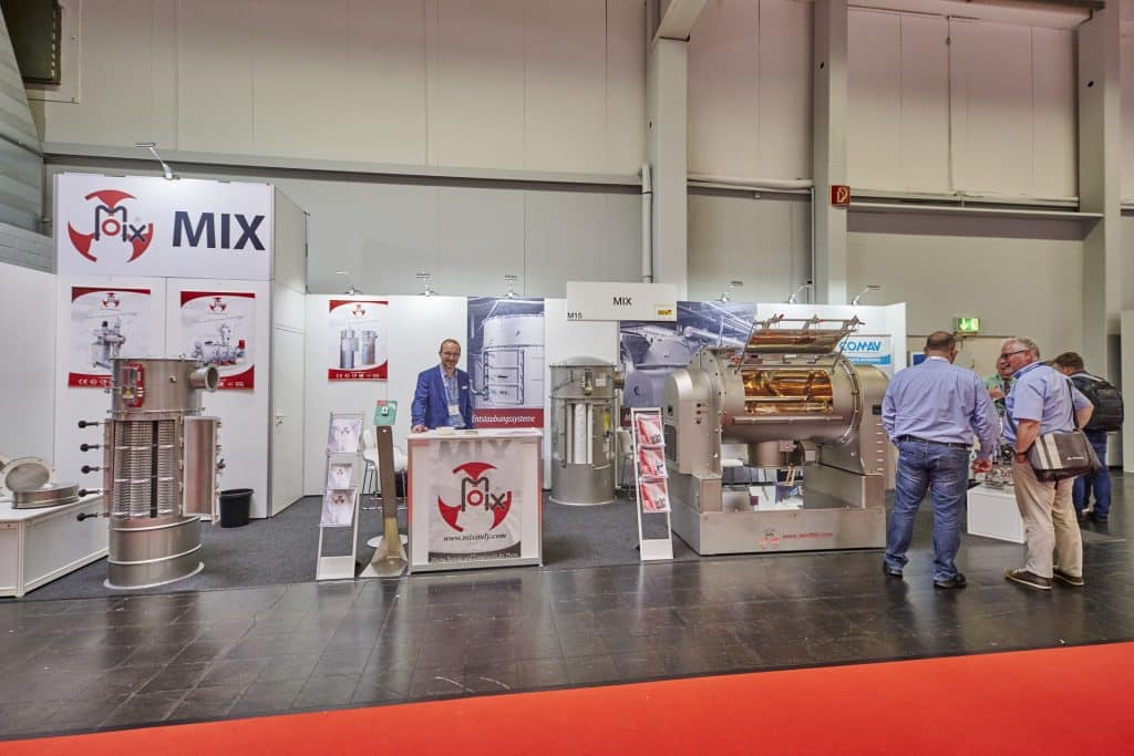 Messestand der >MIX Deutschland GmbH auf der Solids 2022 in Dortmund, auf schuettgutmagazin.de
