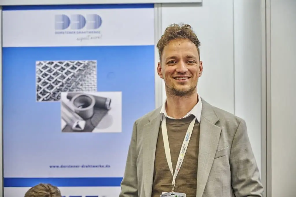 Paul Tüshaus auf dem Solids 2023 Messestand der Dorstener Drahtwerke