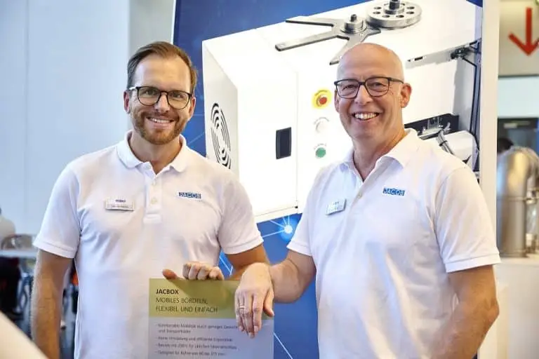 Jan Sondermann und Uwe Schmidt auf dem Jacob Rohre Messestand der Powtech 2023