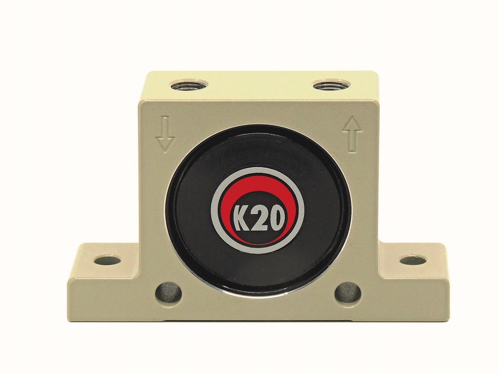 Beiges rechteck mit einem schwarzen kreis mit k 20 drauf